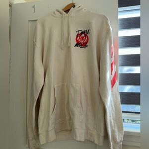 Cream and red Riot Games MSI 2023 Defy hoodie
